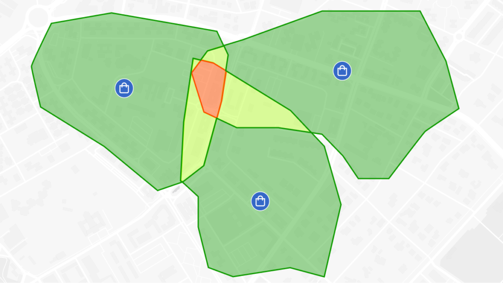 Vista aérea de ciudad con círculos superpuestos indicando solapamiento entre áreas de influencia
